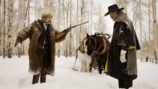 Z filmu Osm hrozných: Kurt Russel jako „kat“ John Ruth a Samuel Lee Jackson v roli majora Marguise Warrena