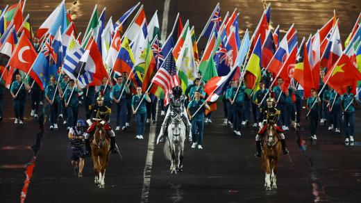 Vlajkový průvod na zahajovací ceremoniál olympijských her