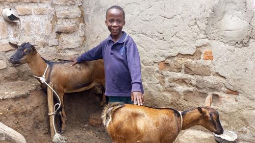 06. Shukurani with his 2 goats.jpg
