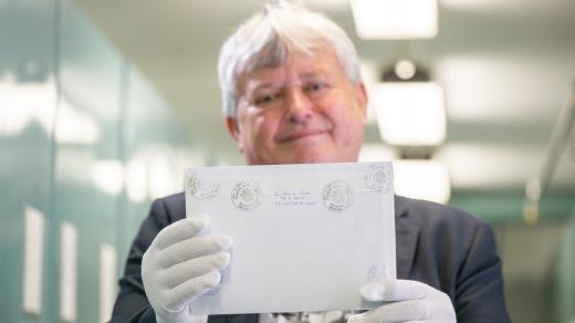 Historik Jiří Křesťan s obálkou se slovy TGM