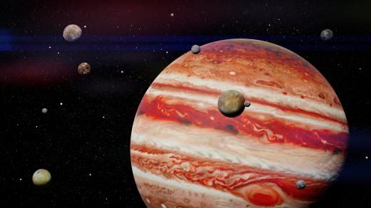 Planeta Jupiter a některé její měsíce